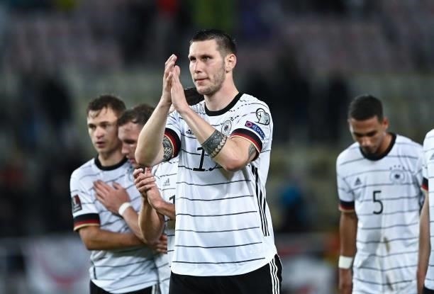 Niklas Suele of Germany applauds to the fans after winning the 2022 FIFA World Cup Qualifier match between North Macedonia and Germany at National...