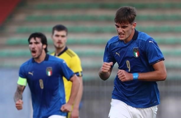 Lorenzo Lucca of Italy celebrates after scoring the opening goal during the 2022 UEFA European Under-21 Championship Qualifier match between Italy...