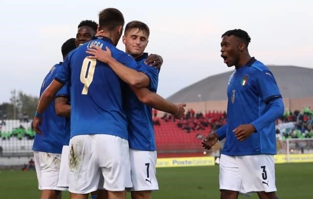 Lorenzo Lucca of Italy celebrates with his team-mates after scoring the opening goal during the 2022 UEFA European Under-21 Championship Qualifier...
