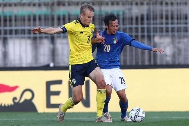 Emanuel Vignato of Italy competes for the ball with Jesper Tolinsson of Sweden during the 2022 UEFA European Under-21 Championship Qualifier match...
