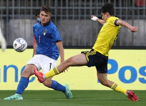 Lorenzo Colombo of Italy competes for the ball with Eric Kahl of Sweden during the 2022 UEFA European Under-21 Championship Qualifier match between...