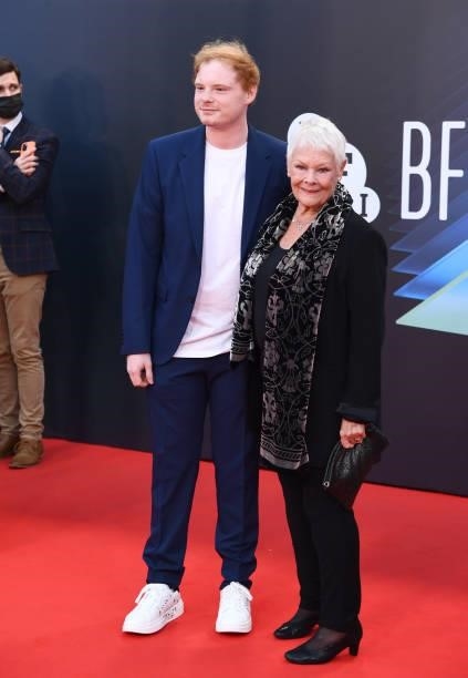 Dame Judi Dench and guest attend the "Belfast