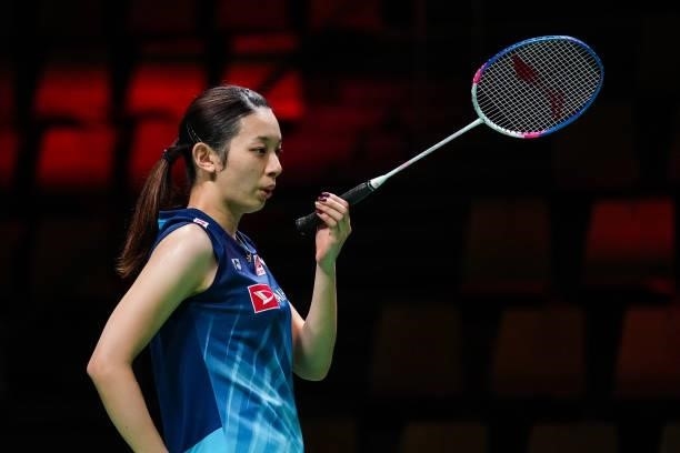 Sayaka Takahashi of Japan reacts in the Women's Single match against Putri Kusuma Wardani of Indonesia during day four of the Thomas & Uber Cup on...