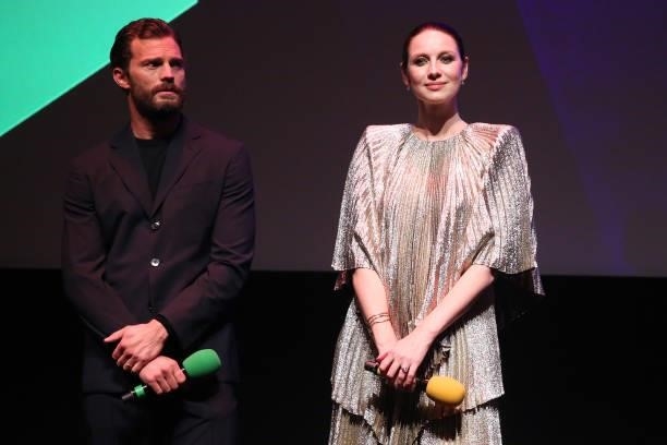 Jamie Dornan and Caitriona Balfe appear on stage at the "Belfast