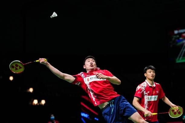 Liu Cheng and Wang Yilyu of China compete in the Men's Double match against Andy Buijk and Brian Wassink of Netherlands during day four of the Thomas...