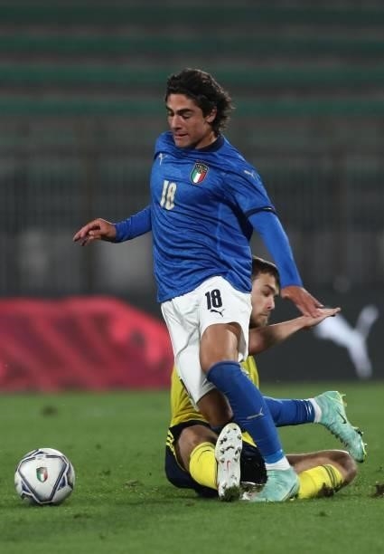 Matteo Cancellieri of Italy competes for the ball with Pavle Vagic of Sweden during the 2022 UEFA European Under-21 Championship Qualifier match...