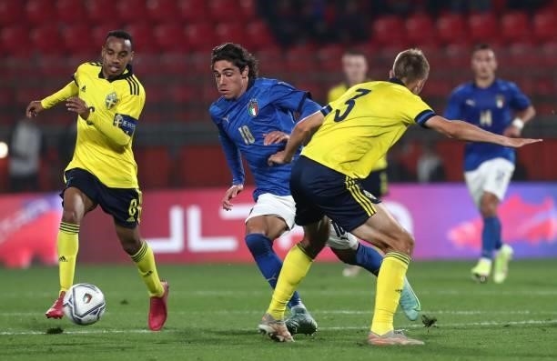 Matteo Cancellieri of Italy competes for the ball with Jesper Tolinsson of Sweden during the 2022 UEFA European Under-21 Championship Qualifier match...