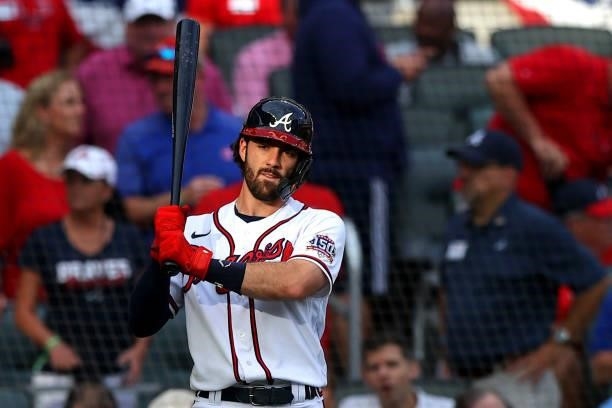 Dansby Swanson of the Atlanta Braves bats during the first inning against the Milwaukee Brewers in game four of the National League Division Series...