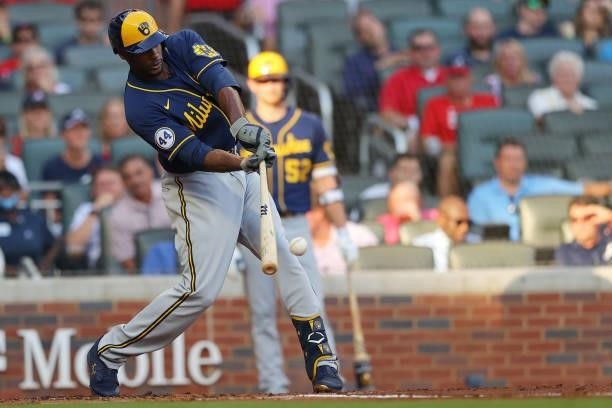 Lorenzo Cain of the Milwaukee Brewers singles during the second inning against the Atlanta Braves in game four of the National League Division Series...