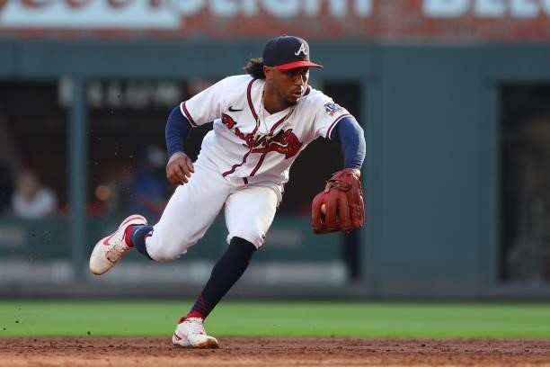 Ozzie Albies of the Atlanta Braves fields a ball during the second inning against the Milwaukee Brewers in game four of the National League Division...