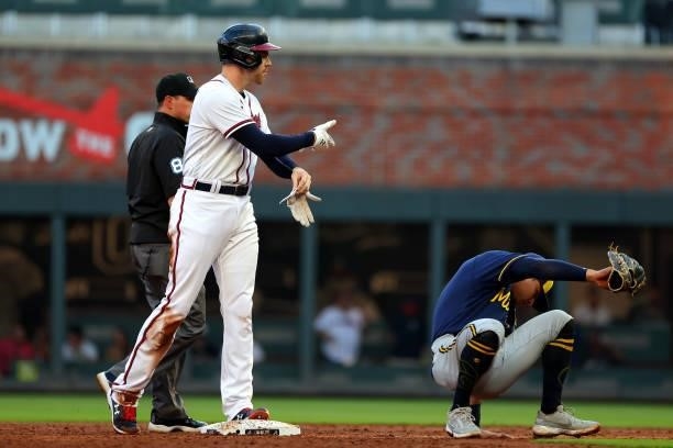 Freddie Freeman of the Atlanta Braves celebrates a double during the third inning against the Milwaukee Brewers in game four of the National League...