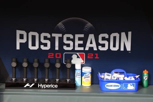 Number of Hyperice Hypervolts are set up in the Milwaukee Brewers dugout at Truist Park on October 12, 2021 in Atlanta, Georgia.