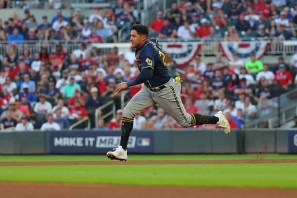 Avisail Garcia of the Milwaukee Brewers advances to second on a wild pitch during the fourth inning against the Atlanta Braves in game four of the...