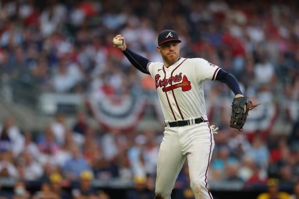 Freddie Freeman of the Atlanta Braves throws during the fourth inning against the Milwaukee Brewers in game four of the National League Division...