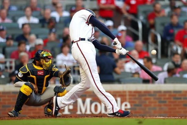 Freddie Freeman of the Atlanta Braves doubles during the third inning against the Milwaukee Brewers in game four of the National League Division...