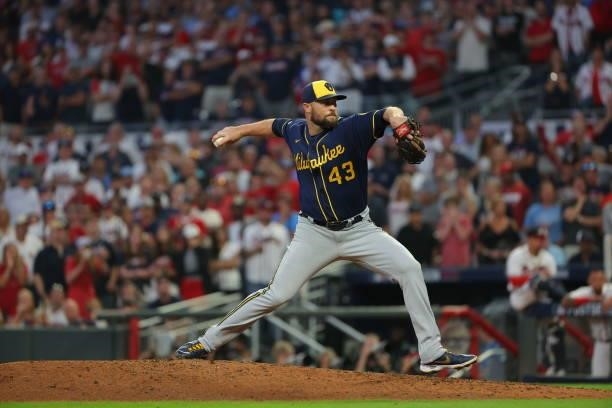 Hunter Strickland of the Milwaukee Brewers delivers during the fourth inning against the Atlanta Braves in game four of the National League Division...
