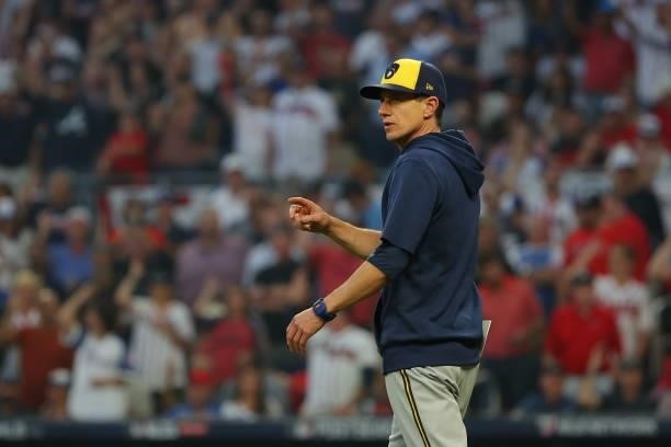 Craig Counsell of the Milwaukee Brewers walks to the mound during the fourth inning against the Atlanta Braves in game four of the National League...