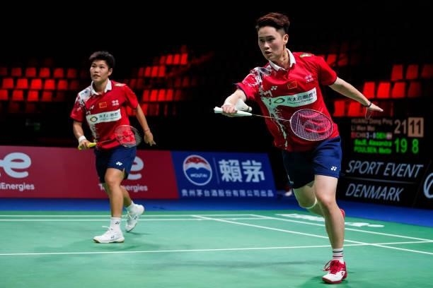 Huang Dongping and Li Wenmei of China compete in the Women's Double match against Alexandra Boje and Mette Poulsen of Denmark during day four of the...