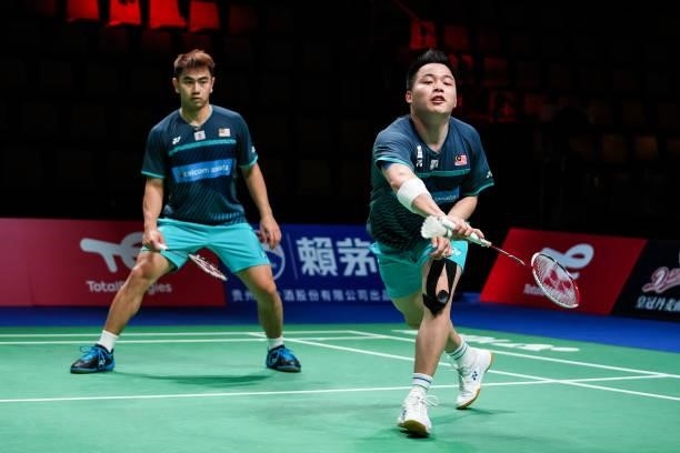 Aaron Chia and Goh Sze Fei of Malaysia compete in the Men's Double match against B.R. Sankeerth and Nyl Yakura of Canada during day four of the...
