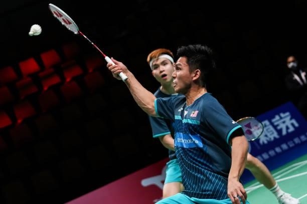 Nur Izzuddin and Soh Wooi Yik of Malaysia compete in the Men's Double match against Phillipe Charron and Maxime Tetreault of Canada during day four...
