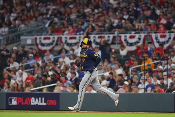 Rowdy Tellez of the Milwaukee Brewers rounds the bases after a two run home run during the fifth inning against the Atlanta Braves in game four of...