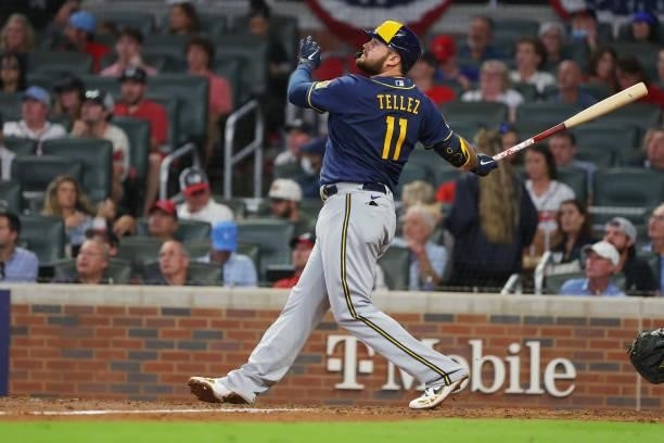 Rowdy Tellez of the Milwaukee Brewers hits a two run home run during the fifth inning against the Atlanta Braves in game four of the National League...