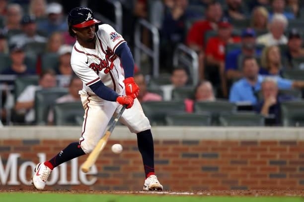 Ozzie Albies of the Atlanta Braves singles during the fifth inning against the Milwaukee Brewers in game four of the National League Division Series...