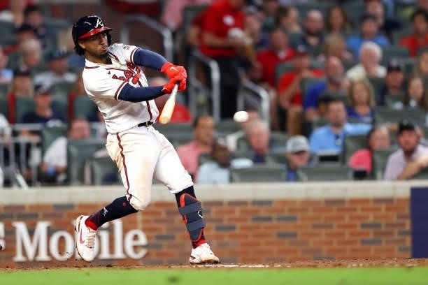 Ozzie Albies of the Atlanta Braves base hit during the sixth inning against the Milwaukee Brewers in game four of the National League Division Series...