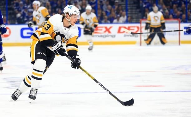 Brock McGinn of the Pittsburgh Penguins looks to pass during the first period of a game against the Tampa Bay Lightningat Amalie Arena on October 12,...