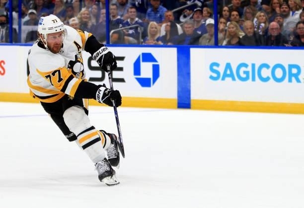 Jeff Carter of the Pittsburgh Penguins shoots during the first period of a game against the Tampa Bay Lightning at Amalie Arena on October 12, 2021...