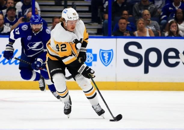 Kasperi Kapanen of the Pittsburgh Penguins looks to pass during the first period of a game against the Tampa Bay Lightning at Amalie Arena on October...