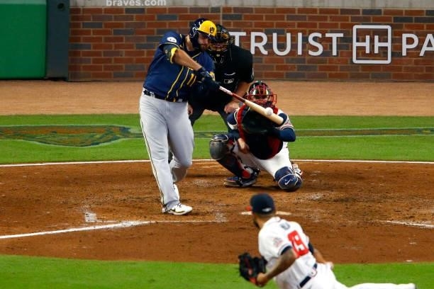 Rowdy Tellez of the Milwaukee Brewers hits a two run home run during the fifth inning against the Atlanta Braves in game four of the National League...