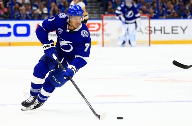 Mathieu Joseph of the Tampa Bay Lightning looks to pass during the second period of a game against the Pittsburgh Penguins at Amalie Arena on October...