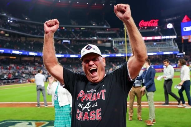 Brian Snitker of the Atlanta Braves reacts following the 5-4 win over the Milwaukee Brewers in game four of the National League Division Series at...