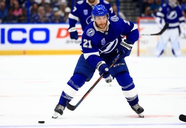 Brayden Point of the Tampa Bay Lightning looks to pass during the second period of a game against the Pittsburgh Penguins at Amalie Arena on October...