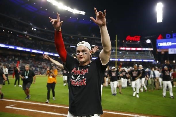 Joc Pederson of the Atlanta Braves reacts to defeating the Milwaukee Brewers 5-4 in game four of the National League Division Series at Truist Park...
