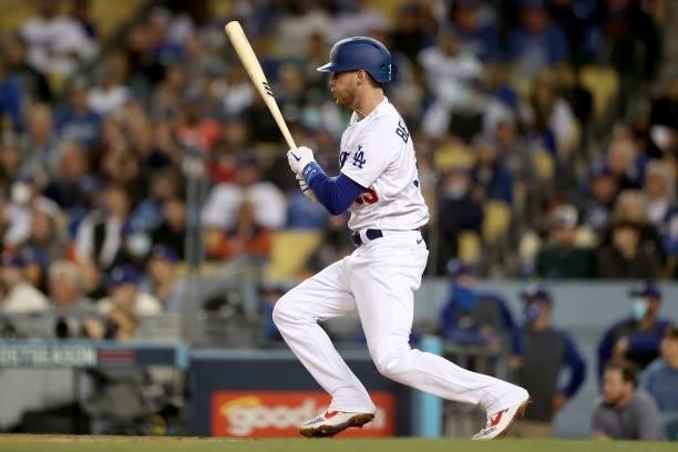 Cody Bellinger of the Los Angeles Dodgers hits a single against the San Francisco Giants during the second inning in game 4 of the National League...