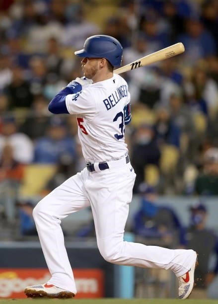 Cody Bellinger of the Los Angeles Dodgers hits a single against the San Francisco Giants during the second inning in game 4 of the National League...