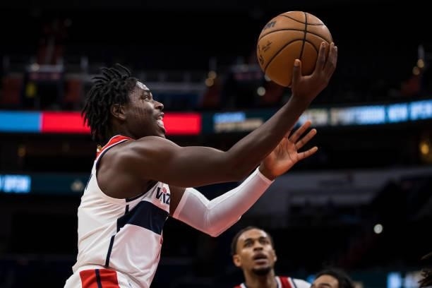 Aaron Holiday of the Washington Wizards goes to the basket against the Toronto Raptors during the second half at Capital One Arena on October 12,...