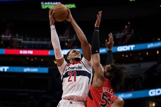Daniel Gafford of the Washington Wizards goes to the basket against Freddie Gillespie of the Toronto Raptors during the second half at Capital One...