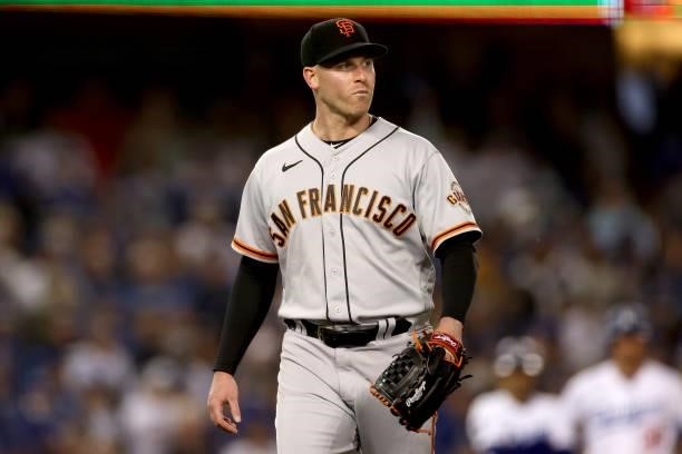 Anthony DeSclafani of the San Francisco Giants leaves the game against the Los Angeles Dodgers during the second inning in game 4 of the National...