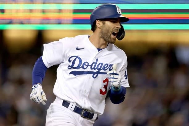 Chris Taylor of the Los Angeles Dodgers reacts to his sacrifice fly to score Gavin Lux of the Los Angeles Dodgers against the San Francisco Giants...