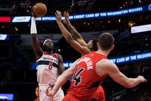 Montrezl Harrell of the Washington Wizards shoots against the Toronto Raptors during the second half at Capital One Arena on October 12, 2021 in...