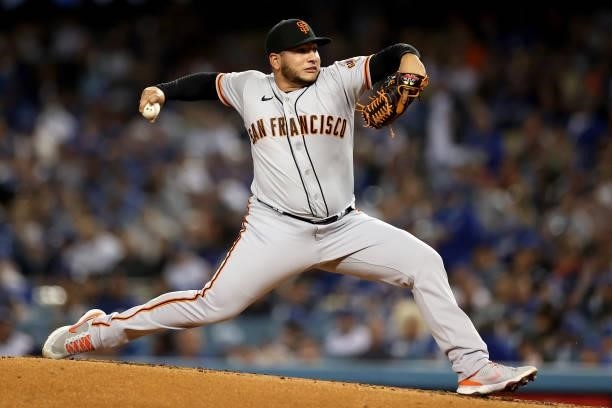 Kervin Castro of the San Francisco Giants pitches against the Los Angeles Dodgers during the third inning in game 4 of the National League Division...