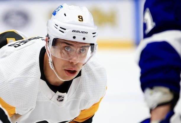 Evan Rodrigues of the Pittsburgh Penguins faces off during the third period of a game against the Tampa Bay Lightning at Amalie Arena on October 12,...