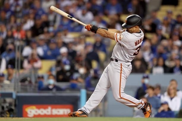 LaMonte Wade Jr. #31 of the San Francisco Giants hits a single against the Los Angeles Dodgers during the second inning in game 4 of the National...