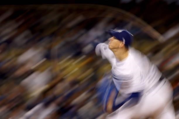 Walker Buehler of the Los Angeles Dodgers pitches against the San Francisco Giants during the third inning in game 4 of the National League Division...