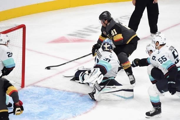 Jonathan Marchessault of the Vegas Golden Knights scores on Philipp Grubauer of the Seattle Kraken at 6:36 of the first period of the Kraken's...