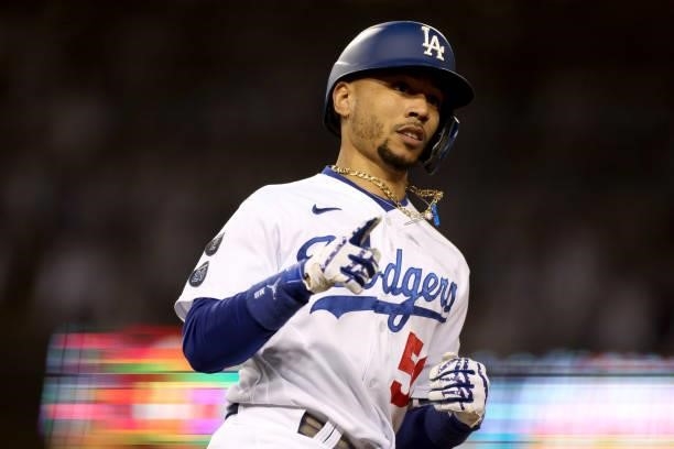 Mookie Betts of the Los Angeles Dodgers celebrates his two run home run against the San Francisco Giants during the fourth inning in game 4 of the...