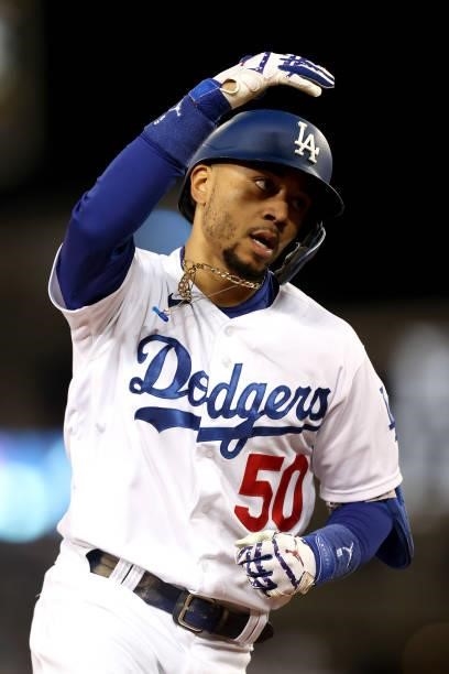 Mookie Betts of the Los Angeles Dodgers reacts after his two run home run against the San Francisco Giants during the fourth inning in game 4 of the...